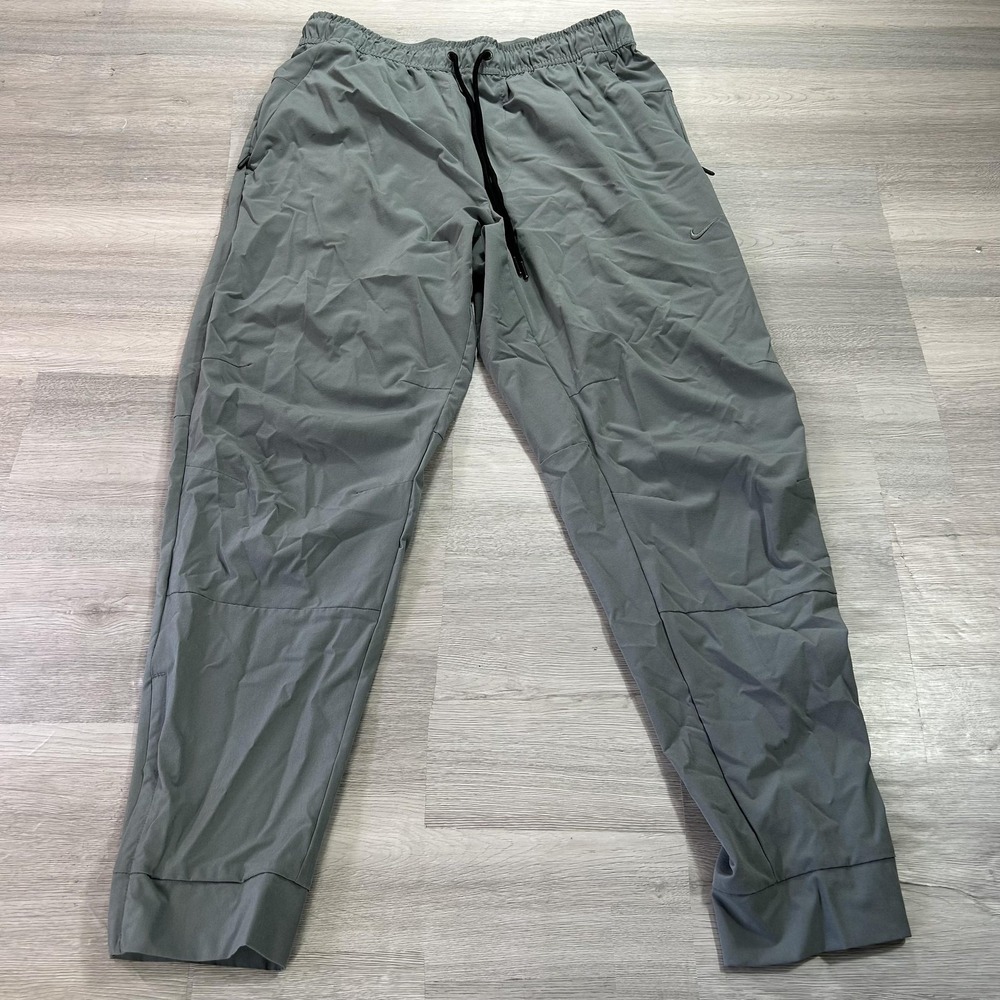 Nike Dri-FIT Track Pants Mens Medium Gray Woven Zip Hem Athletic FB7548-084‎